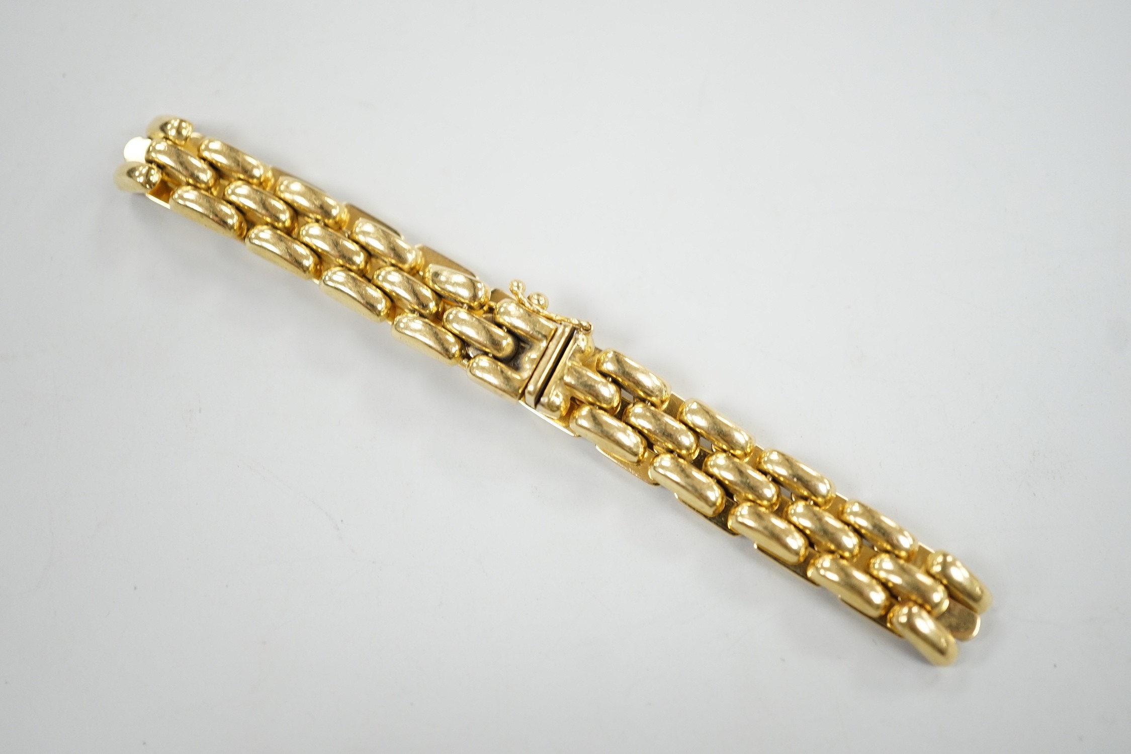 A modern 18ct gold brick link bracelet, 19cm, 21.2 grams.